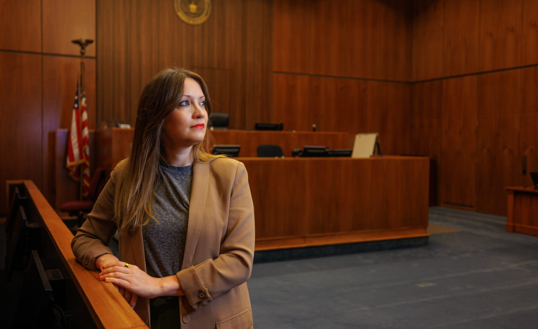 Professor Danielle Jefferis standing inside a courtroom