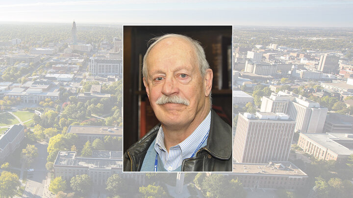 Color portrait of Greg Stejskal on color campus background