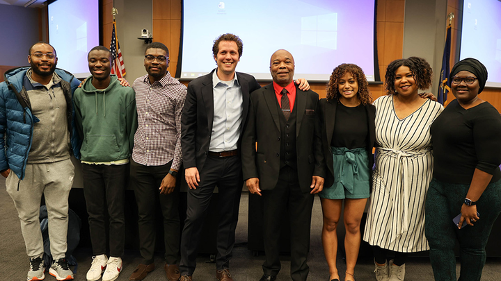 Members of BLSA pose for a photo with Professor Daniel Gutman and Shakur Abdulllah.