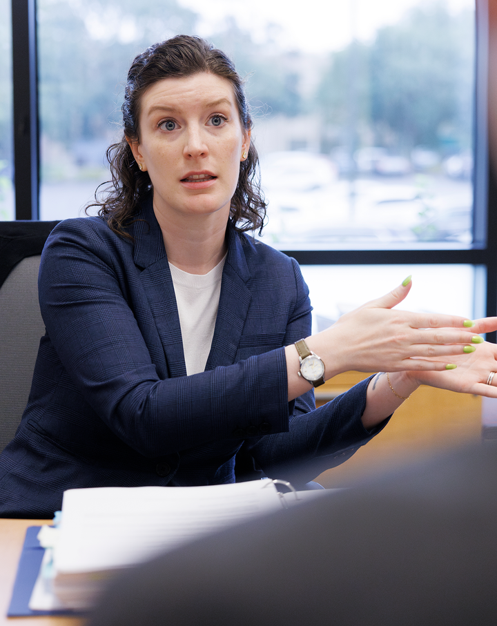 Professor Elizabeth Cole speaks to a student