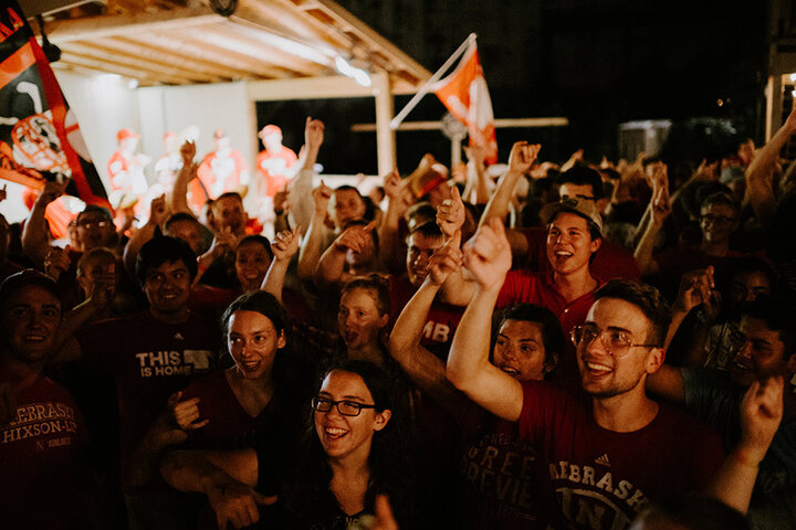 Husker crowd cheering at something offscreen