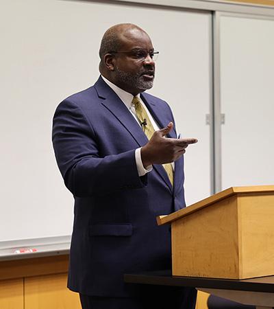 Professor Atiba Ellis speaks at the College of Law